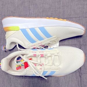 Adidas women’s running shoe. White and multi-colored. Never worn.